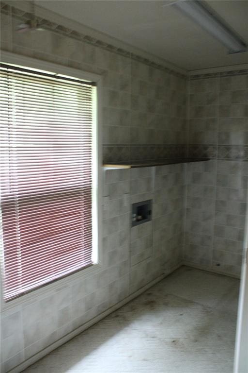 laundry room with plenty of natural light