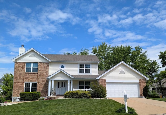 3121 Willow Bend Dr, Saint Charles, MO 63303 - traditional-style home with driveway, an attached garage, a front yard, a chimney, and brick siding