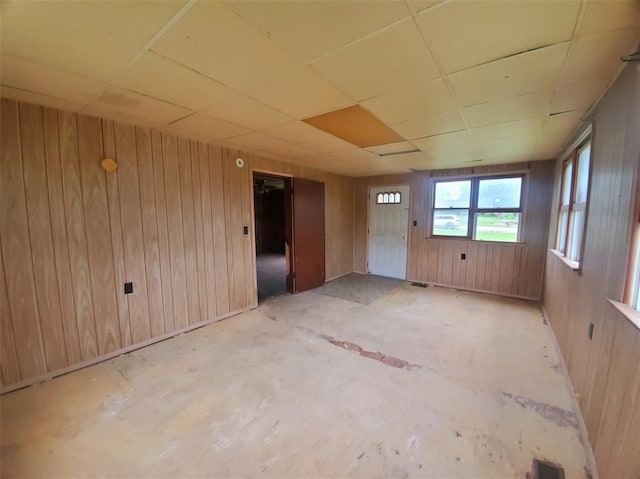 517 N 4th St, La Grange, MO 63448 - unfurnished room featuring wooden walls and a paneled ceiling