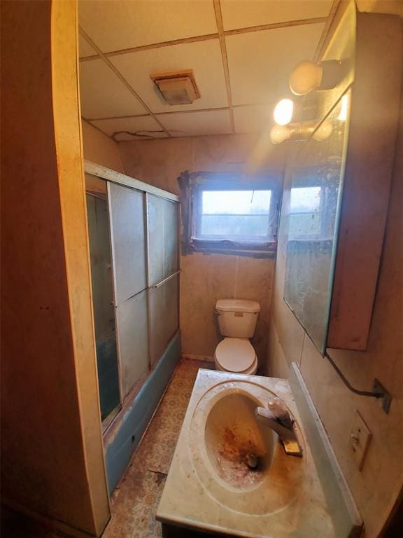 517 N 4th St, La Grange, MO 63448 - bathroom featuring a shower with shower door, toilet, and vanity