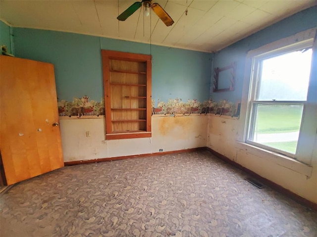 517 N 4th St, La Grange, MO 63448 - unfurnished room with ceiling fan and baseboards