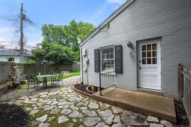 view of patio / terrace with a fenced backyard and outdoor dining space