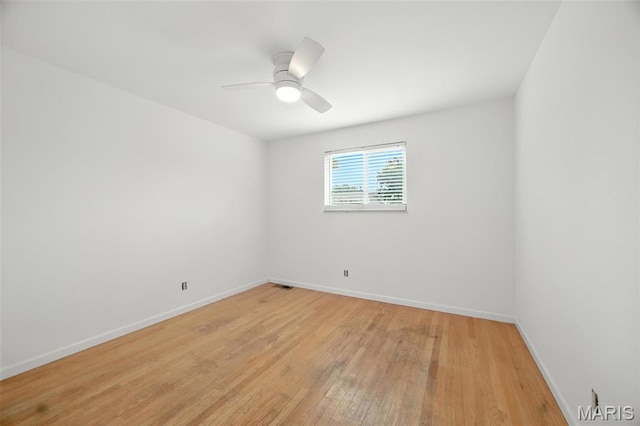 2649 Georgia Dr, Arnold, MO 63010 - spare room featuring light wood-type flooring and a ceiling fan