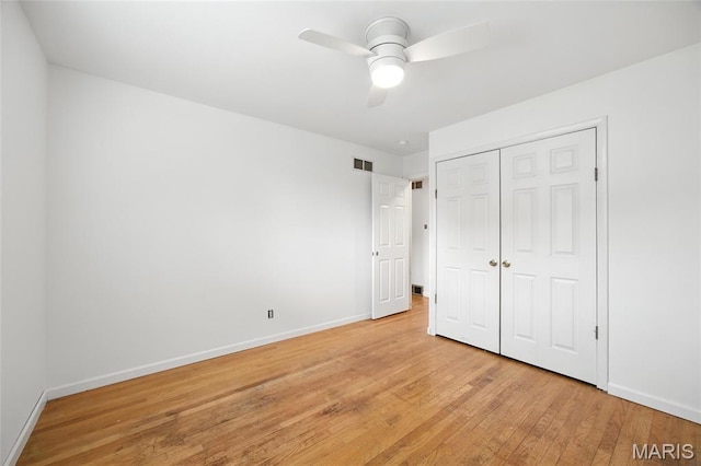 2649 Georgia Dr, Arnold, MO 63010 - unfurnished bedroom featuring light wood-type flooring, a closet, and ceiling fan