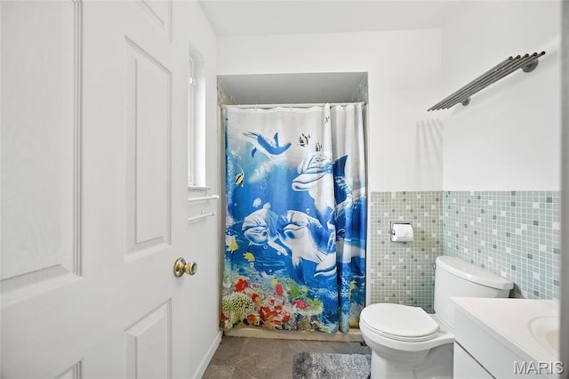 2649 Georgia Dr, Arnold, MO 63010 - full bathroom with vanity, tile patterned flooring, a shower with curtain, wainscoting, and tile walls