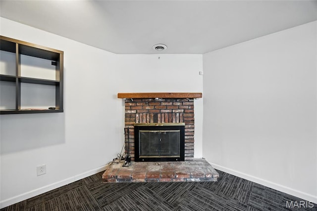 2649 Georgia Dr, Arnold, MO 63010 - detailed view of a brick fireplace and carpet flooring