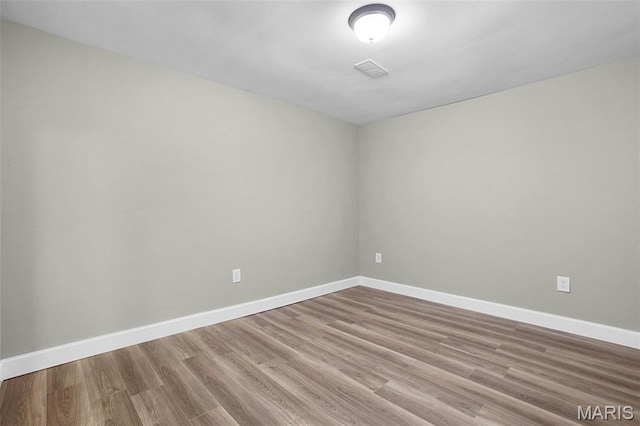 14938 Pike 139, Bowling Green, MO 63334 - spare room with wood finished floors and baseboards
