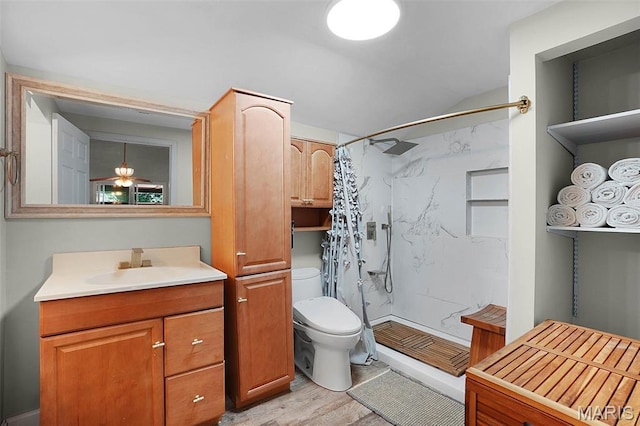 14938 Pike 139, Bowling Green, MO 63334 - full bathroom featuring toilet, a marble finish shower, vanity, and wood finished floors