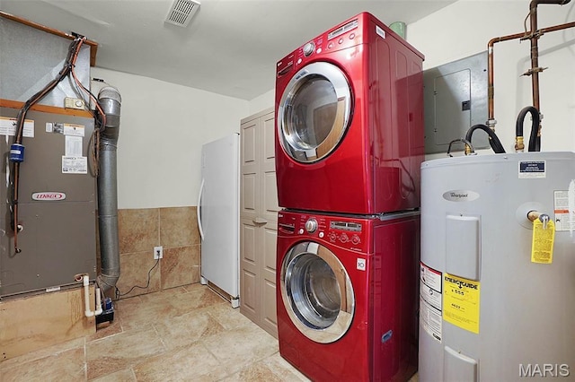 14938 Pike 139, Bowling Green, MO 63334 - washroom featuring stacked washer / drying machine, electric water heater, electric panel, and heating unit