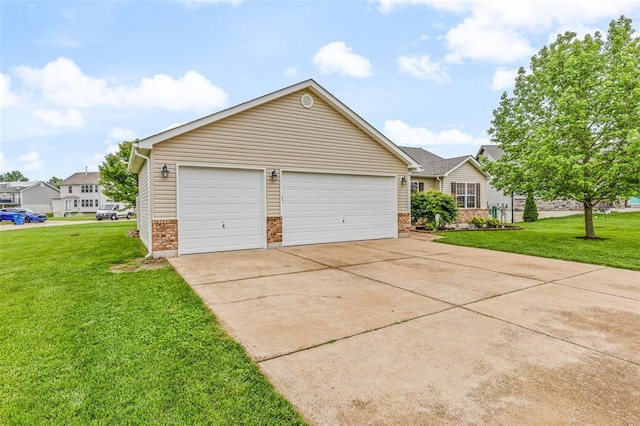 view of front of house featuring brick siding, a front lawn, and driveway