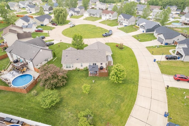aerial perspective of suburban area with a pool area