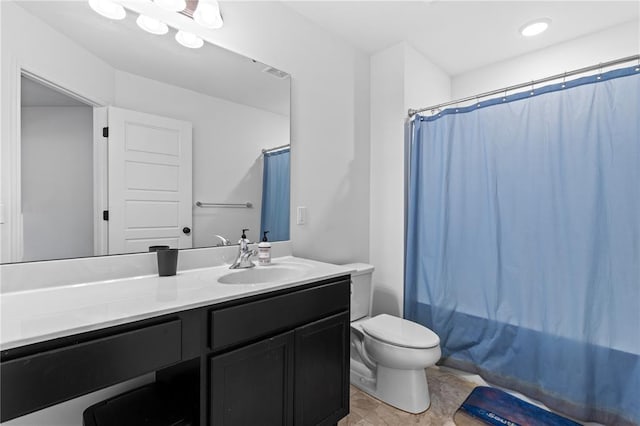 full bathroom with vanity, toilet, shower / bath combo with shower curtain, and marble finish flooring