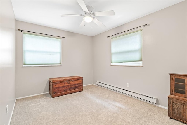 10003 Sakura Dr Unit B, Concord Township, MO 63128 - carpeted empty room featuring baseboard heating, a ceiling fan, and baseboards