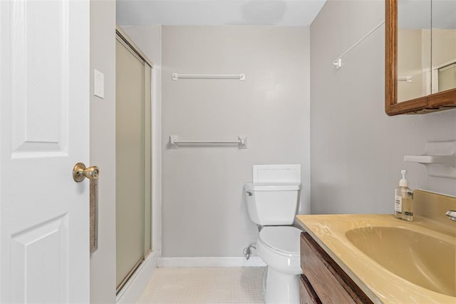 10003 Sakura Dr Unit B, Concord Township, MO 63128 - bathroom featuring a shower stall, toilet, tile patterned flooring, and baseboards
