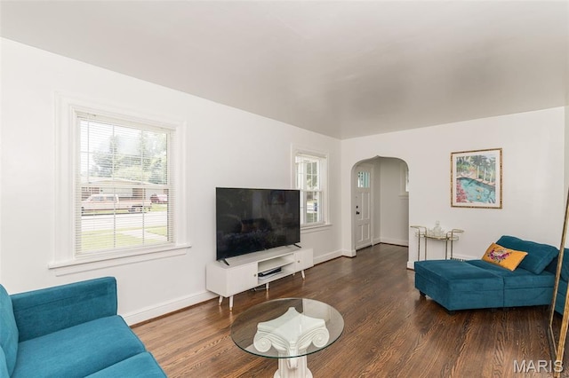 2235 Brown Rd, Overland, MO 63114 - living area with arched walkways and wood finished floors