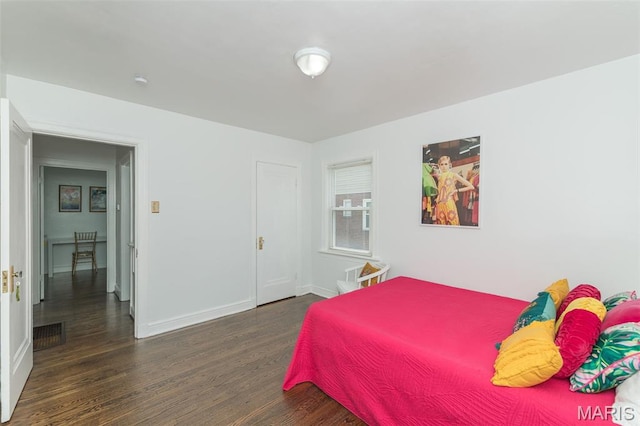 2235 Brown Rd, Overland, MO 63114 - bedroom with wood finished floors and a closet