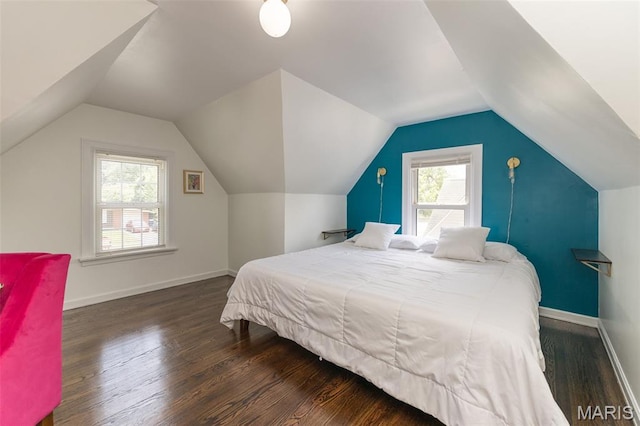 2235 Brown Rd, Overland, MO 63114 - bedroom with multiple windows, wood finished floors, and lofted ceiling