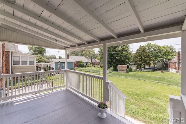 2235 Brown Rd, Overland, MO 63114 - wooden terrace featuring an outbuilding, a yard, and a residential view
