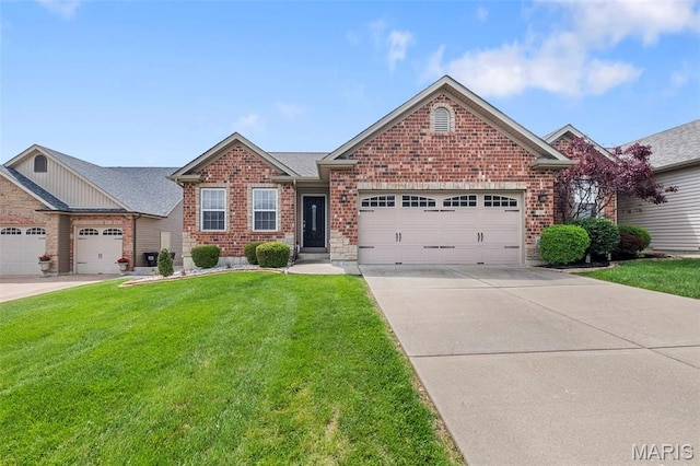 205 Stephanie Lynn Ct, Wentzville, MO 63385 - view of front of home featuring an attached garage, brick siding, a front yard, and driveway