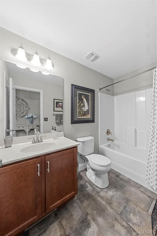 205 Stephanie Lynn Ct, Wentzville, MO 63385 - full bathroom featuring vanity, toilet, and shower / bath combo