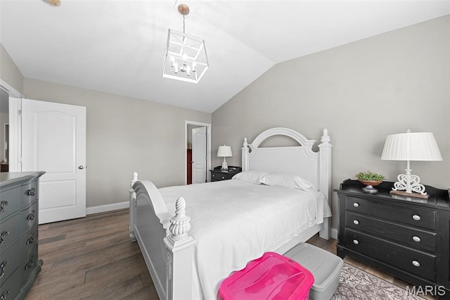 205 Stephanie Lynn Ct, Wentzville, MO 63385 - bedroom featuring lofted ceiling, dark wood finished floors, a chandelier, and baseboards