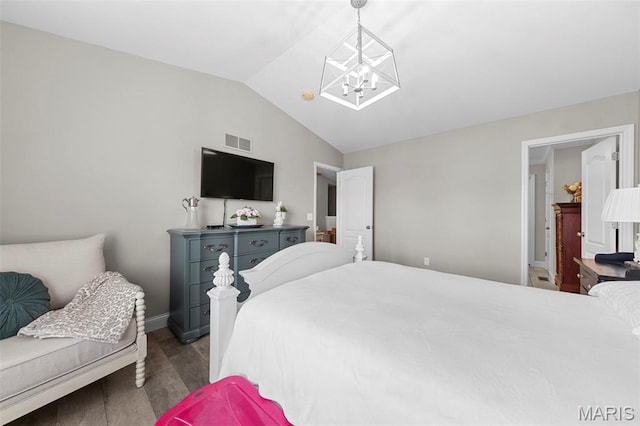 205 Stephanie Lynn Ct, Wentzville, MO 63385 - bedroom featuring wood finished floors, a chandelier, lofted ceiling, and baseboards