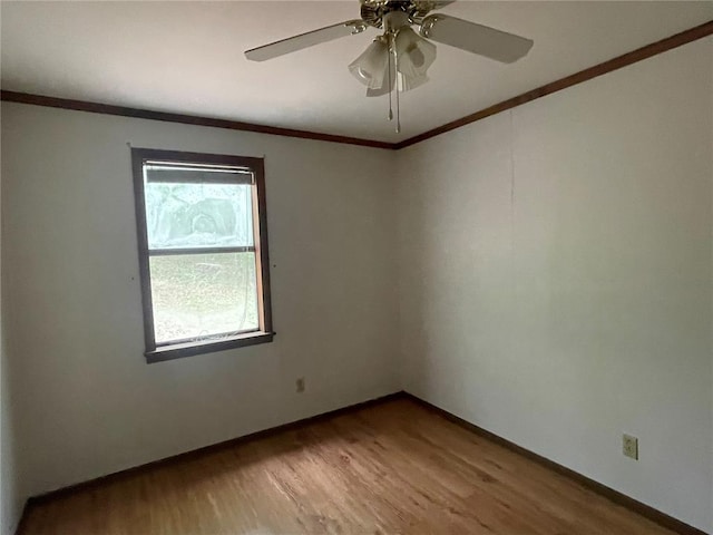 729 State Highway U, Burfordville, MO 63739 - spare room featuring ornamental molding, light wood-style flooring, baseboards, and a ceiling fan