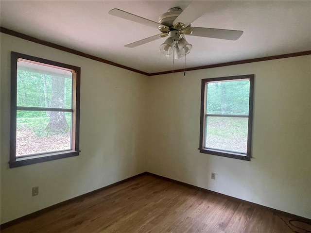 729 State Highway U, Burfordville, MO 63739 - unfurnished room with dark wood-type flooring, crown molding, and a ceiling fan
