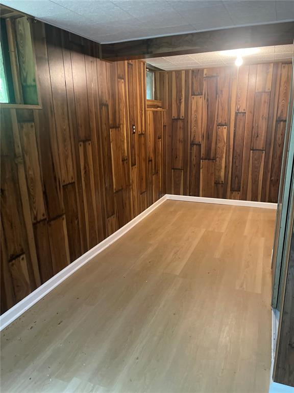 729 State Highway U, Burfordville, MO 63739 - finished below grade area featuring wood walls and wood finished floors