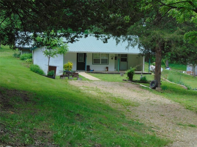 1184 Ripley 21n-10, Doniphan, MO 63935 - rear view of property featuring a porch, a lawn, and metal roof