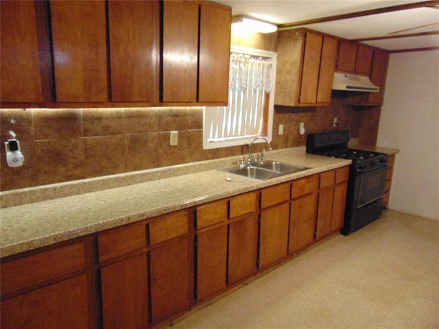 1184 Ripley 21n-10, Doniphan, MO 63935 - kitchen featuring black gas range oven, ventilation hood, a sink, backsplash, and brown cabinetry