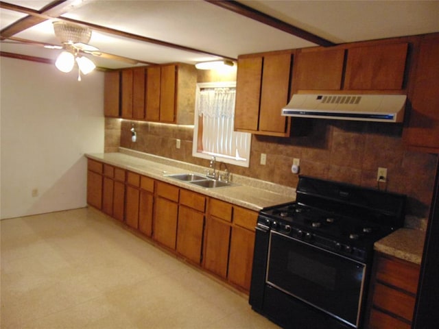 1184 Ripley 21n-10, Doniphan, MO 63935 - kitchen featuring gas stove, exhaust hood, brown cabinetry, and a sink
