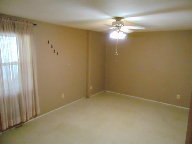 1184 Ripley 21n-10, Doniphan, MO 63935 - spare room featuring a ceiling fan, light colored carpet, and baseboards