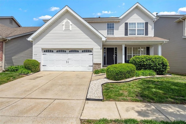 traditional-style home featuring a garage, driveway, brick siding, and a porch
