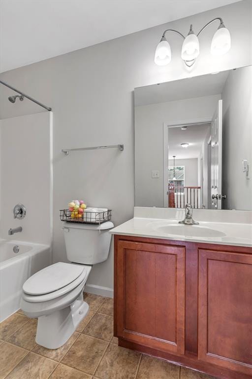 bathroom with toilet, vanity, and shower / bath combination