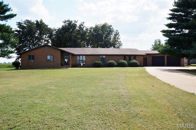 7526 State Highway 164, Cardwell, MO 63829 - single story home featuring brick siding, a garage, a front yard, and driveway