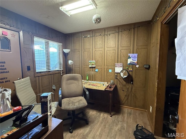 7526 State Highway 164, Cardwell, MO 63829 - office area with a textured ceiling and light wood finished floors