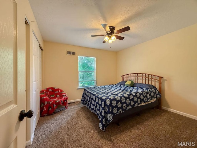 524 Arrowhead Pt, Cedar Hill, MO 63016 - bedroom with carpet, ceiling fan, a closet, and a textured ceiling