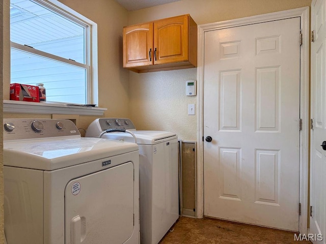 524 Arrowhead Pt, Cedar Hill, MO 63016 - washroom with washing machine and dryer and cabinet space