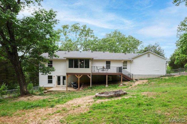 524 Arrowhead Pt, Cedar Hill, MO 63016 - rear view of property featuring stairway, a wooden deck, a patio area, an outdoor fire pit, and a sunroom