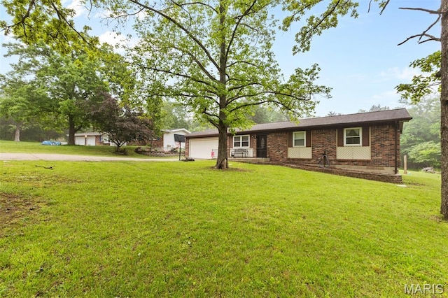 1414 Rue Camille, Bonne Terre, MO 63628 - ranch-style home featuring driveway, a garage, brick siding, and a front yard