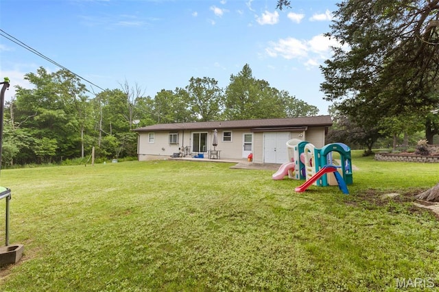 1414 Rue Camille, Bonne Terre, MO 63628 - rear view of property with a lawn and a patio