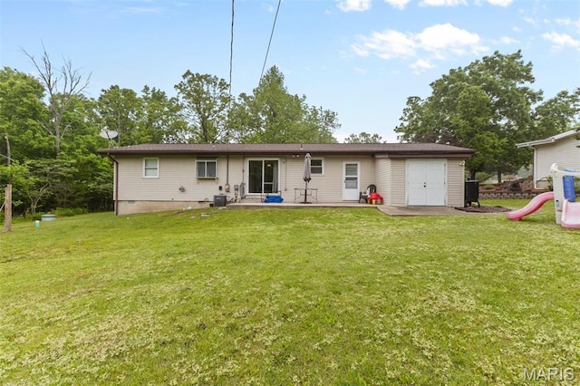 1414 Rue Camille, Bonne Terre, MO 63628 - rear view of property with crawl space, a playground, a yard, and a patio area