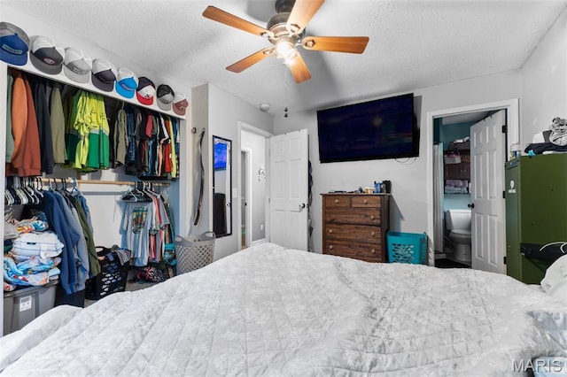 1414 Rue Camille, Bonne Terre, MO 63628 - bedroom with a closet, a textured ceiling, and a ceiling fan