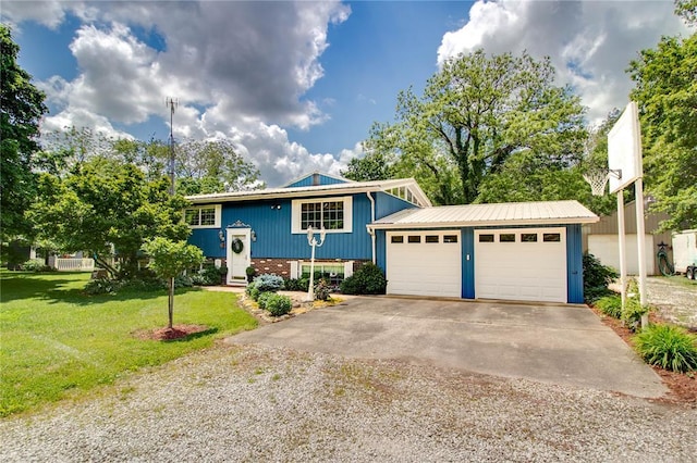 23571 Peppermill Ln, Hettick, IL 62649 - split foyer home featuring driveway, a front lawn, brick siding, an attached garage, and metal roof
