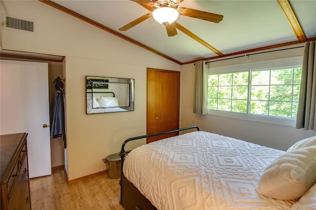 23571 Peppermill Ln, Hettick, IL 62649 - bedroom featuring lofted ceiling, light wood-style flooring, ornamental molding, a closet, and ceiling fan