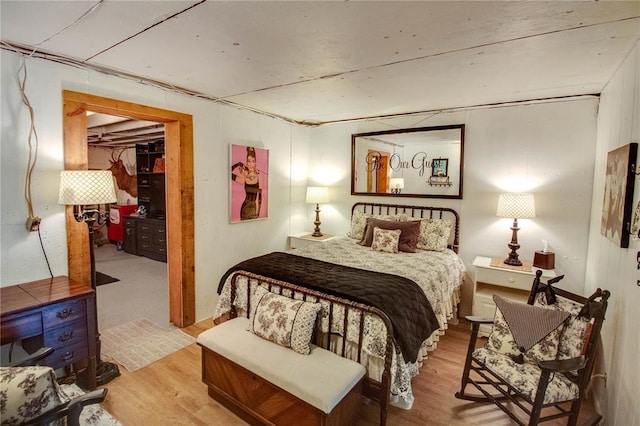 23571 Peppermill Ln, Hettick, IL 62649 - bedroom with wood finished floors, a walk in closet, and a closet