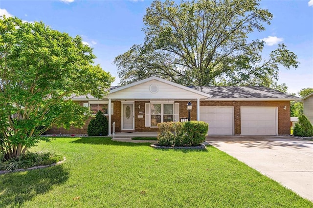 226 Ridgeview Dr, Columbia, IL 62236 - ranch-style house with an attached garage, driveway, a front lawn, and brick siding
