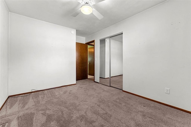 226 Ridgeview Dr, Columbia, IL 62236 - unfurnished bedroom featuring carpet floors, a closet, baseboards, and ceiling fan