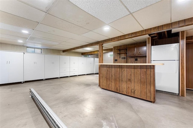 226 Ridgeview Dr, Columbia, IL 62236 - basement with freestanding refrigerator, a bar, a paneled ceiling, recessed lighting, and plenty of natural light